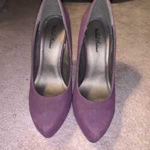 Purple spiked back stilettos